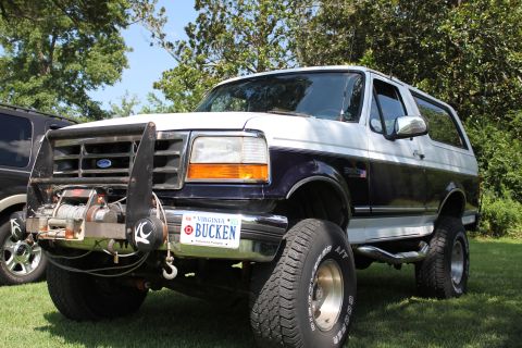 1994 Ford Bronco - This 1994 Ford Bronco features a prominent winch and brush guard on its front end.