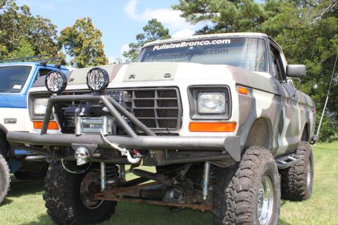 1994 Ford Bronco - This modified Ford Bronco features a custom front bumper and camouflage paint.