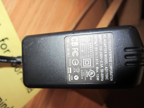 1963 Ford Falcon - This AC adapter has a label detailing its input and output specifications, including model number AD1709C.
