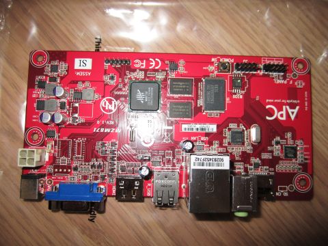 1963 Ford Falcon - A red circuit board with visible components and connectors, not a vehicle.