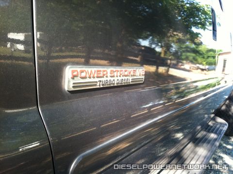 2003 Ford F-250 - Close-up of the Power Stroke V8 Turbo Diesel badge on a 2003 Ford F-250 Super Duty.
