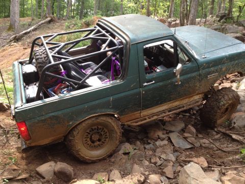 1979 Ford F-150 - This modified pickup truck is equipped for off-road adventures on a challenging rocky trail.