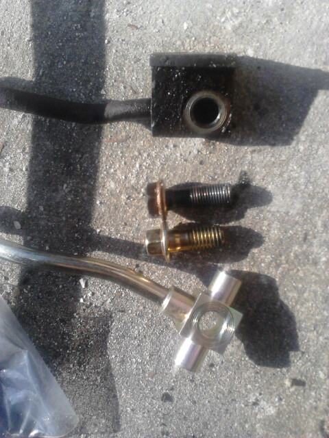 1996 Ford Bronco - Top is the original Ford brake hose and bolt. Bottom is a new Chevy brake hose and bolt. The ford bolt uses a more fine thread bolt that is…