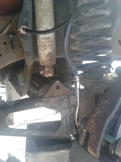 1996 Ford Bronco - New chevy brake hose installed. i wont cover how i did this because i didnt do it the best way. it doesnt correctly mount to the frame so i…