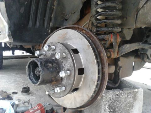 1996 Ford Bronco - Put the hub/rotor assembly on. Put the first spindle nut on. it will have a little nub on 1 side which points away from the truck. Tighten…
