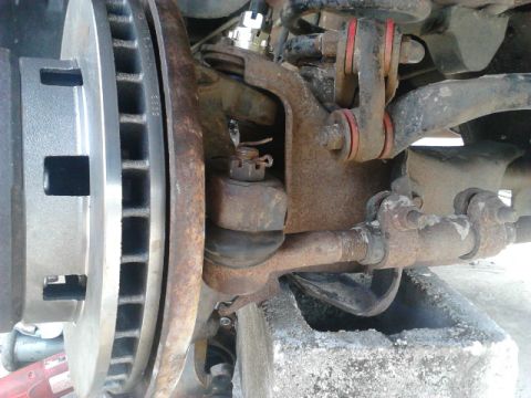 1996 Ford Bronco - Put the Tierod back on. If the stud just spins, try putting pressure upward. If it still spins try using a jack to force it up with more fo…
