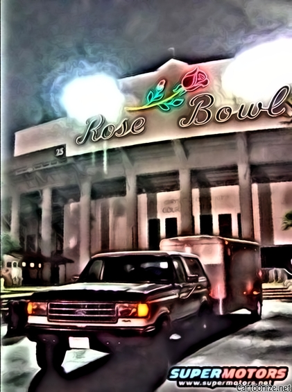 1990 Ford Bronco - A Ford Bronco tows a trailer past the iconic Rose Bowl stadium.