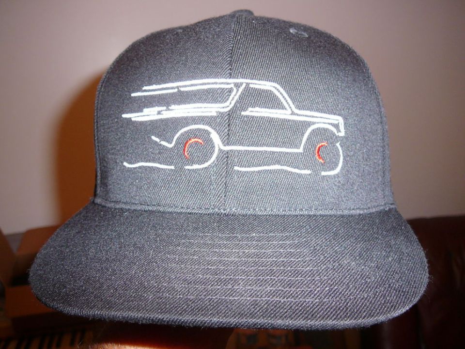 Black baseball cap with white outline of a classic SUV