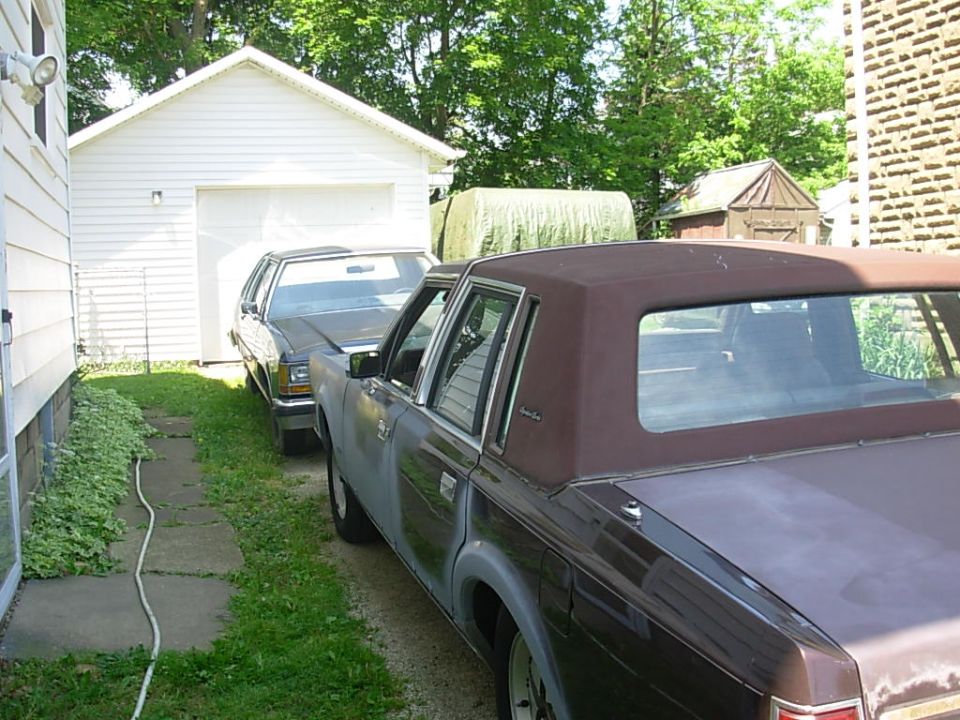 1988 Lincoln Town Car rear quarter view, brown