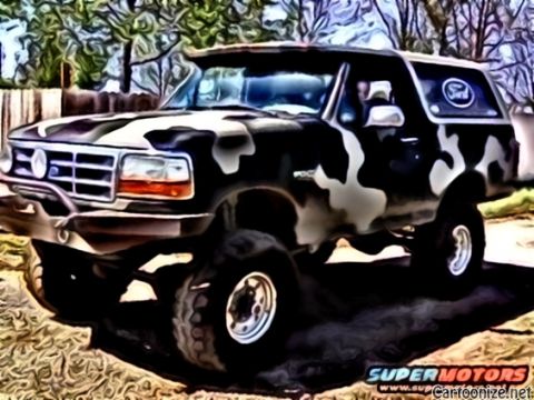 1995 Ford Bronco - This lifted 1995 Ford Bronco features a unique camouflage paint scheme and aftermarket front bumper.
