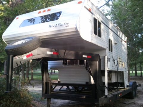 1967 Ford Mustang - Truck camper unit labeled "WeekEnder" is mounted on a gooseneck trailer.