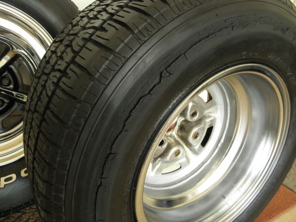 Cracked tire sidewall on a chrome wheel with a five-lug pattern