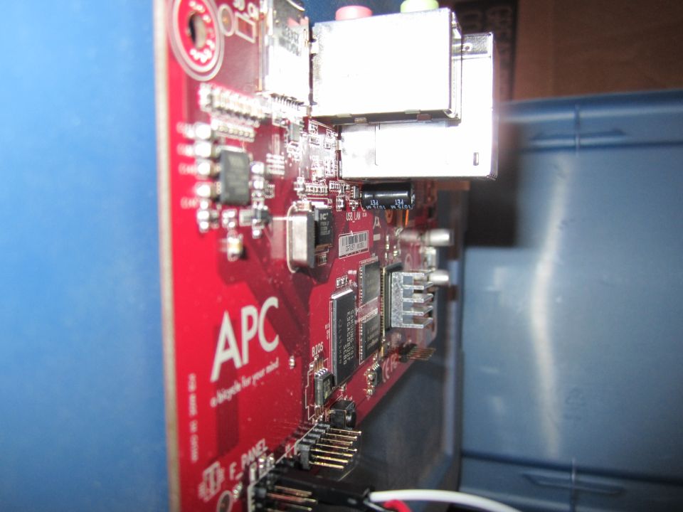APC circuit board with connectors and chips visible. Text reads 'APC a bicycle for your mind'