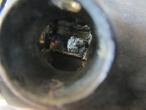 1964 Ford Ranchero - The internal components of a broken shifter mechanism are visible, showing damage.