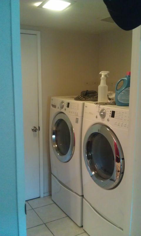 1989 Ford Bronco - Two front-loading washing machines are visible in a laundry room setting.