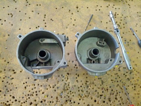 1978 Ford Bronco - 302 on left, 460 on right. need to cut hole in 460 housing for tfi module, also have to drill and tap 1 hole seen on left side of 302 housi…