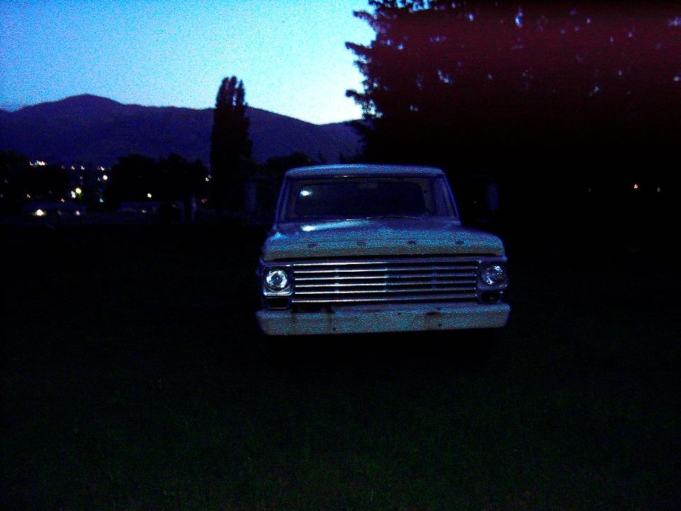 1967 Ford F-250 front view at dusk