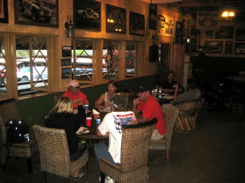 1996 Ford Bronco - Diners sit at tables in a restaurant decorated with Baja 500 racing memorabilia.