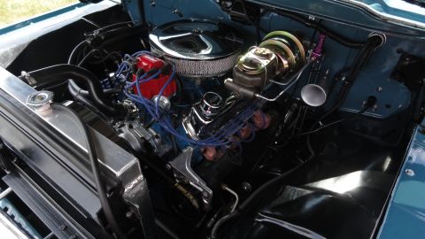 1964 Ford Fairlane - Close-up view of a clean engine bay, showing various engine components and wiring.