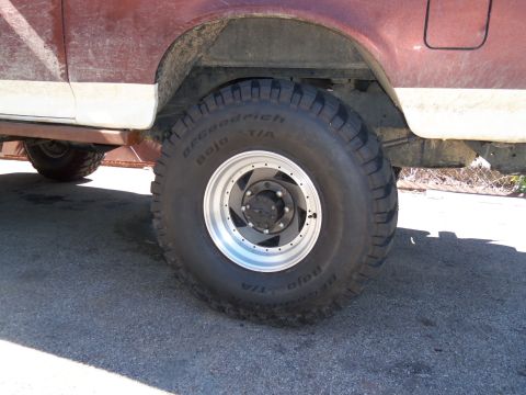 1989 Ford Bronco - The side view focuses on the tire and wheel assembly of a large truck.