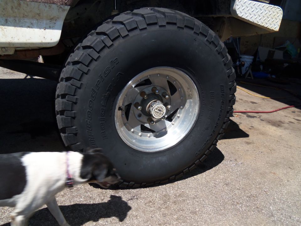 BFGoodrich All-Terrain T/A tire on a silver five-spoke wheel, part of a vehicle