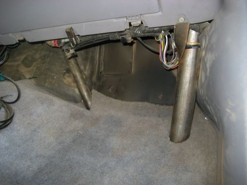 1996 Ford Bronco - Close-up view of the vehicle's interior, showing exposed wiring and metal components.
