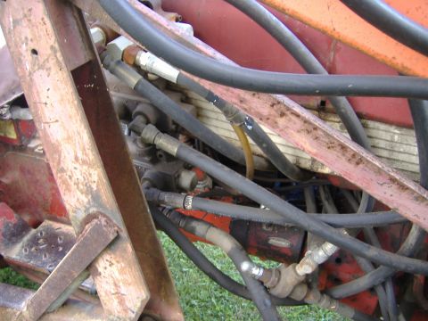 1988 Ford Bronco - This image shows a section of hydraulic hoses and a metal frame, not a 1988 Ford Bronco.