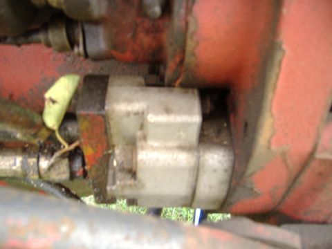 1988 Ford Bronco - This image shows a close-up view of a hydraulic pump assembly, likely from a tractor or heavy equipment.