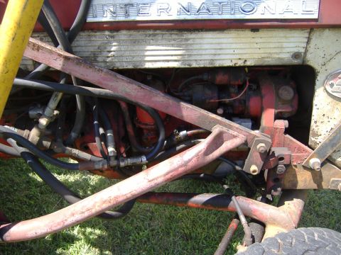 1988 Ford Bronco - The engine and hydraulic system of an International Harvester tractor are visible in this close-up shot.