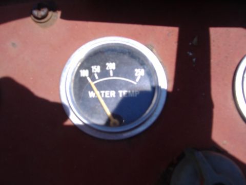 1988 Ford Bronco - A close-up view of a water temperature gauge on a vehicle's dashboard.