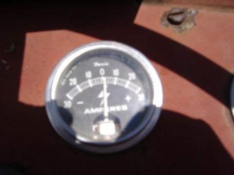 1988 Ford Bronco - Close-up of an ampere gauge, showing the needle centered at zero.