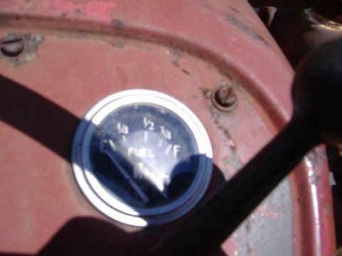 1988 Ford Bronco - Fuel gauge showing less than a quarter tank.