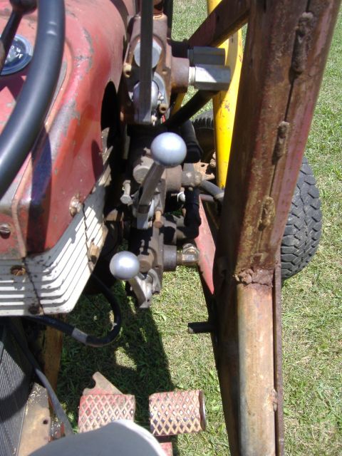 1988 Ford Bronco - The controls and pedals of a tractor are shown in this close-up view.