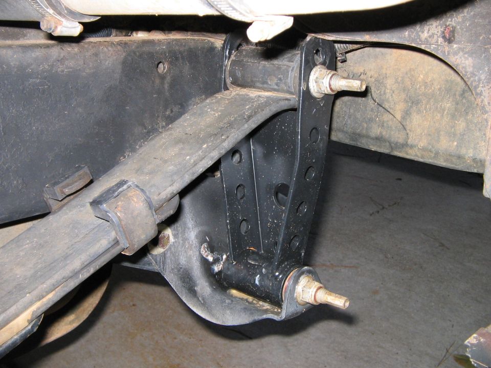 Relocated the rear spring shackles. Thoses are 05 F150 springs
