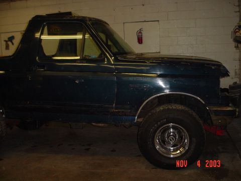 1988 Ford Bronco - No visor, No KC lights, No Nerf bars, No pinstriping, No bugshield, no headlights or grill