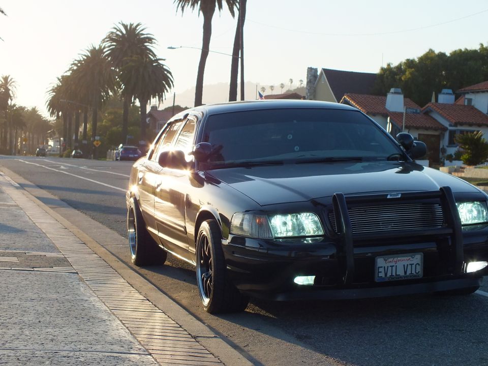 Black Crown Victoria front-three-quarter with push bar and EVIL VIC plate