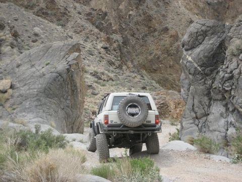 1985 Toyota 4Runner - A white 1985 Toyota 4Runner navigates a off-road trail in Death Valley.