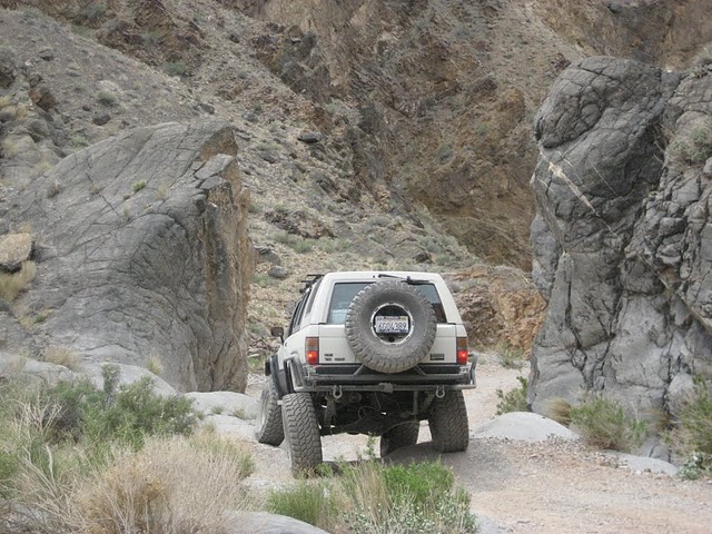 White 1985 Toyota 4Runner on a rocky trail in Death Valley