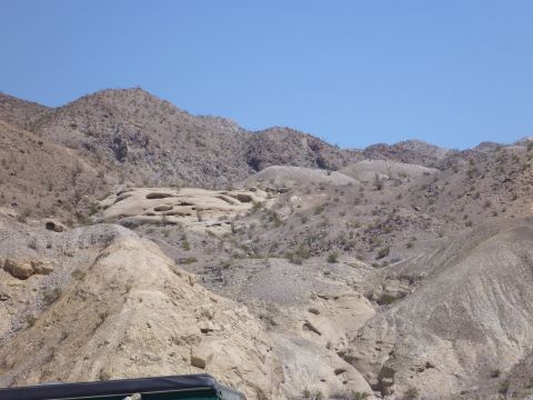 1985 Toyota 4Runner - A wide view of a desert landscape mountains and arid terrain.