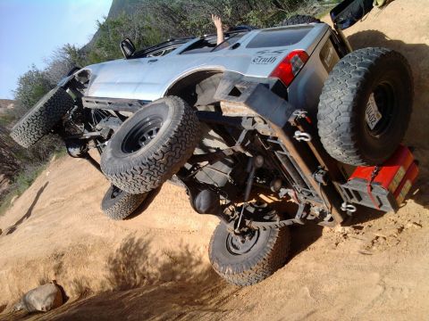 1985 Toyota 4Runner - This off-road SUV has tipped onto its side while navigating a steep dirt incline.
