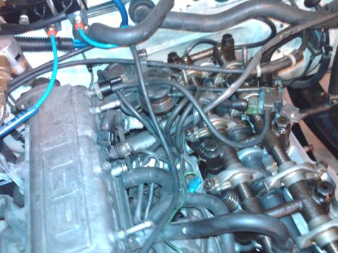 1985 Toyota 4Runner - A detailed view of engine components, including valves and wiring, is shown in this photograph.
