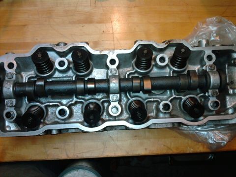 1985 Toyota 4Runner - Close-up view of an engine cylinder head with internal components visible.