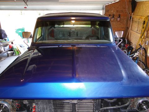 1978 Ford Bronco - Front view of a blue 1978 Ford Bronco parked inside a garage.