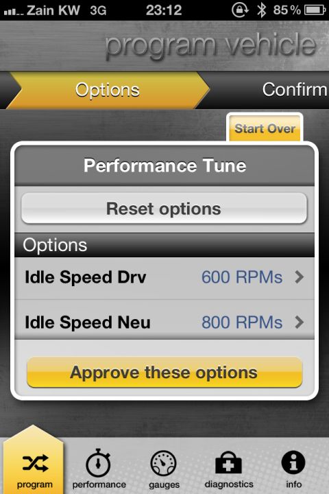 2001 Mercury Grand Marquis - The 'program vehicle' interface displays options for performance tuning, including idle speed adjustments.