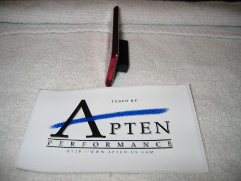 2002 Ford Taurus - A red car tail light assembly is shown with a logo for Apten Performance.