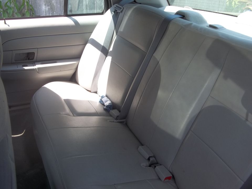 Rear bench seat and door panel inside a car