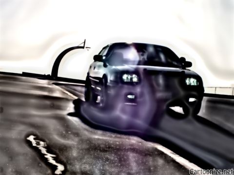 2003 Ford Crown Victoria - Blurred artistic edit of a dark full-size sedan on a bridge, headlights lit beneath a cable-stay arch.