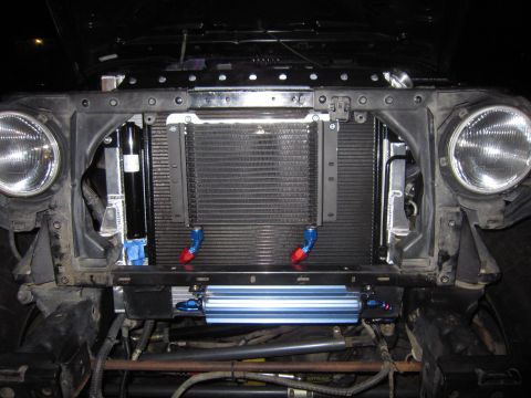 2008 Jeep Wrangler - Front view of a 2007 Jeep Wrangler with an installed aftermarket oil cooler and modified radiator setup.