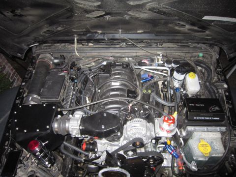 2008 Jeep Wrangler - Custom Hemi engine swap in a Jeep Wrangler, an aftermarket intake system and various performance modifications.