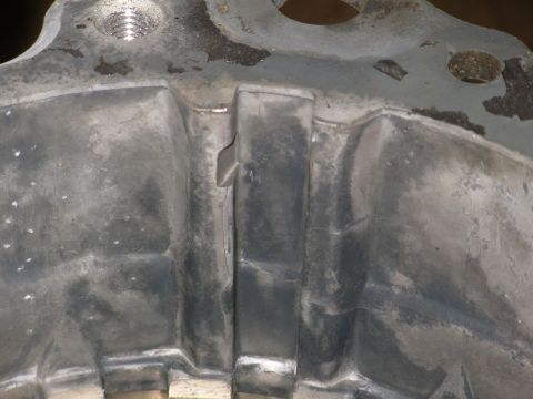 1983 Ford Bronco - This is the important part. The pump stay arm has barely worn into the case rib. If it was much worse, I'd clean the case & JBWeld it. But…